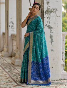Teal Raw Silk Blend Saree With Ikat Weaving - Fabanza